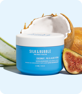 Silk and bubble Your Mane Attraction Super Nourishing Hair Growth Mask in use, deeply nourishing and strengthening hair from root to tip